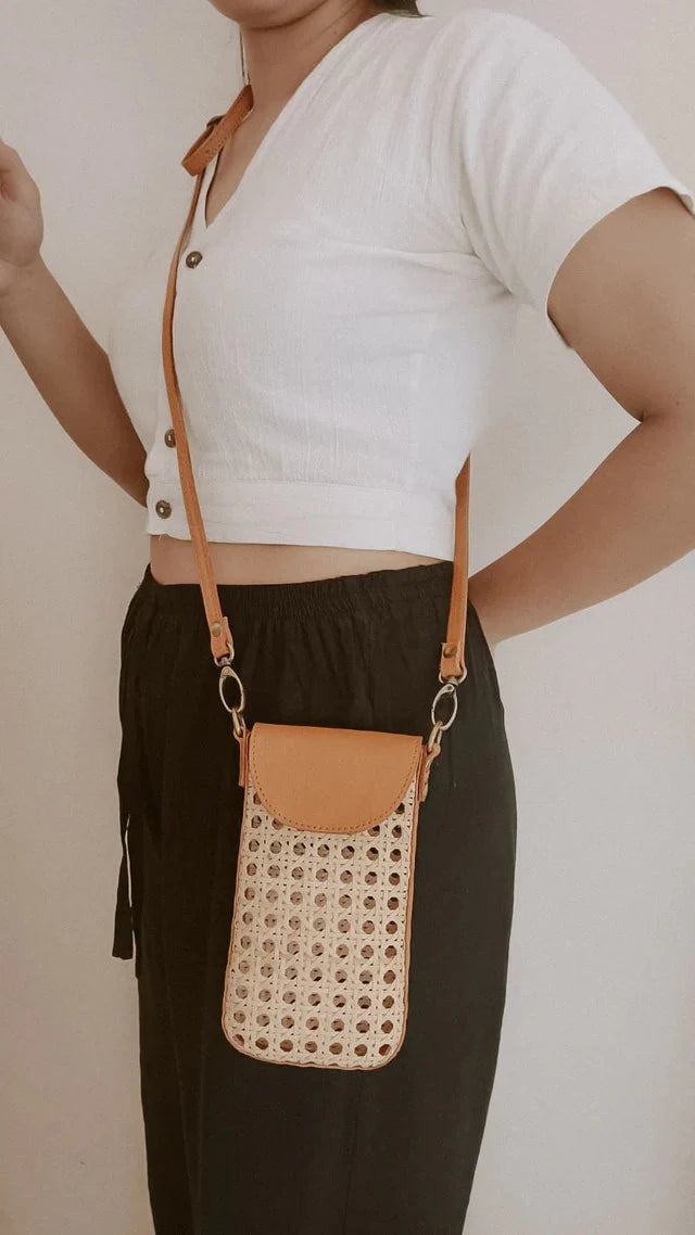 *dimensions needed* Nia Leather and Rattan Phone Sling Crossbody Bags Village Thrive Camel 