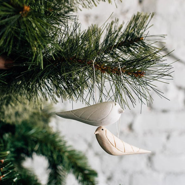 Hand-Carved Bird Ornament Featured Azizi Life 